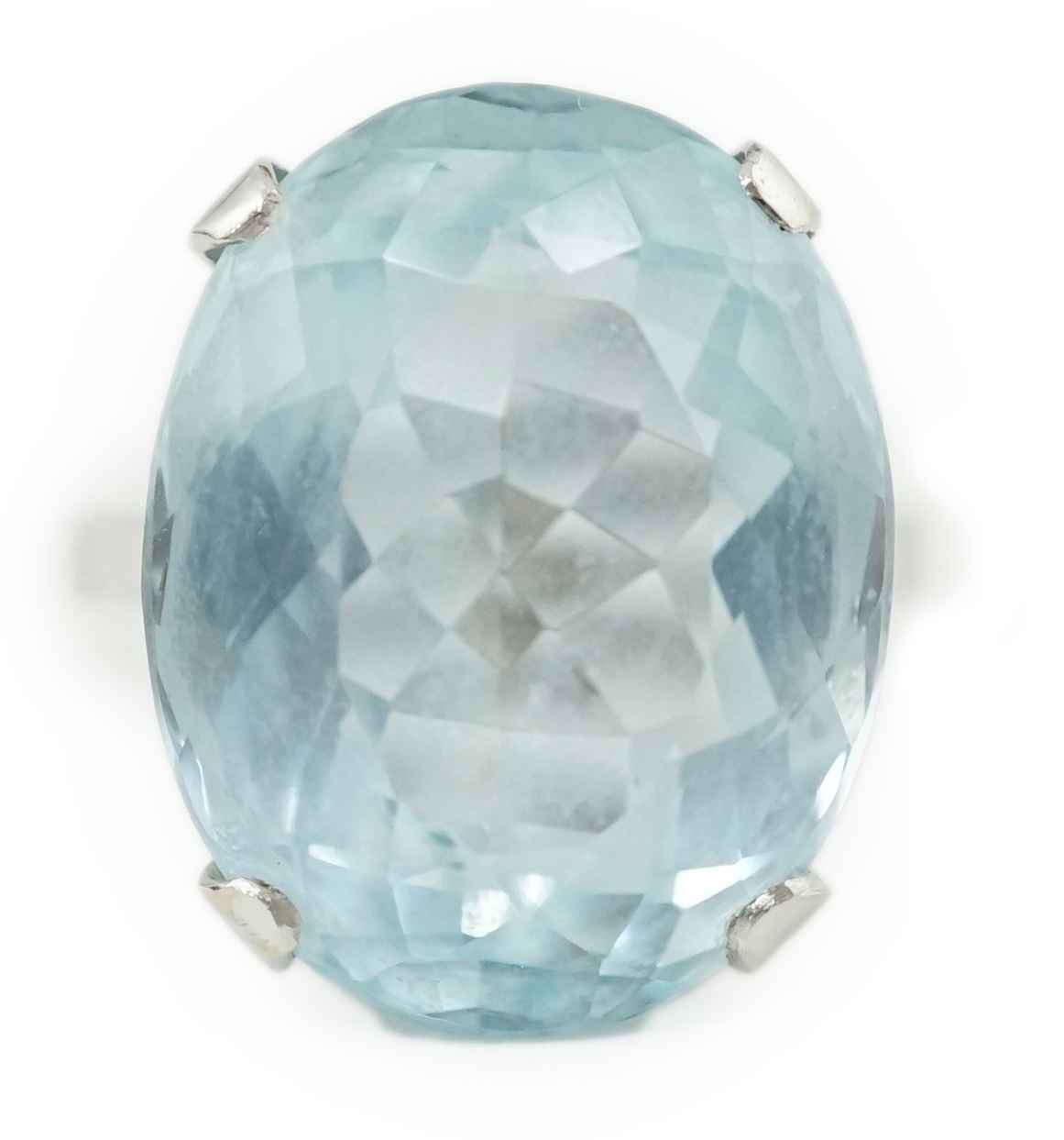 A mid 20th century 18ct white gold and single stone oval cut aquamarine set dress ring